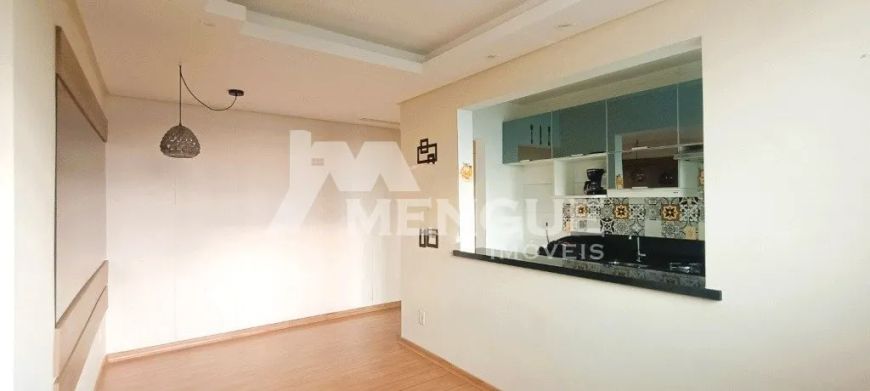Apartamento com 3 dormitórios e 1 vaga de garagem, à venda no bairro Sarandi em Porto Alegre com 58m