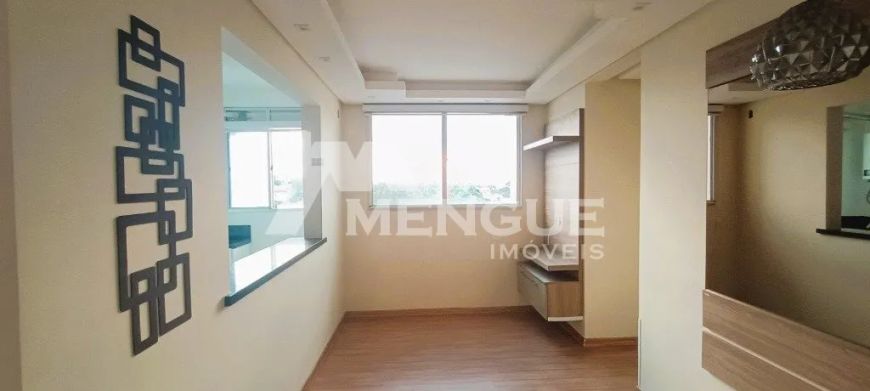 Apartamento com 3 dormitórios e 1 vaga de garagem, à venda no bairro Sarandi em Porto Alegre com 58m