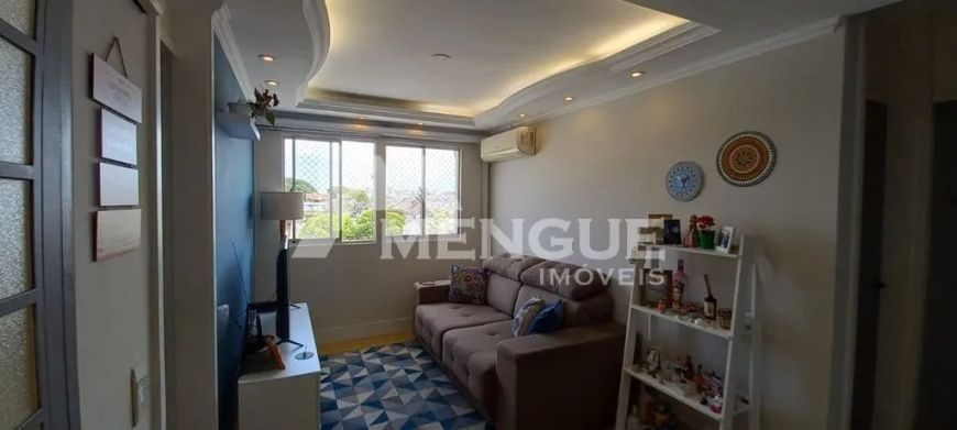 Apartamento com 3 dormitórios e 1 vaga de garagem, à venda no bairro Sarandi em Porto Alegre com 52m