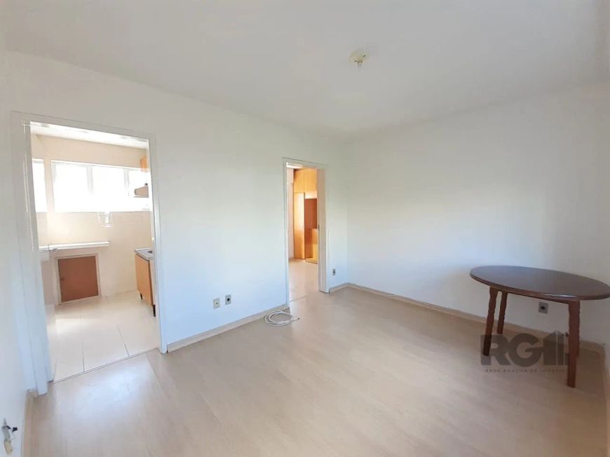 Apartamento com 1 dormitório semi mobiliado, arejado e ensolarado, living 2 ambientes, cozinha, área