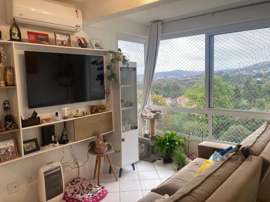 Apartamento com 3 (três) dormitórios sendo 1 suíte no bairro Cavalhada!Amplo apartamento com living