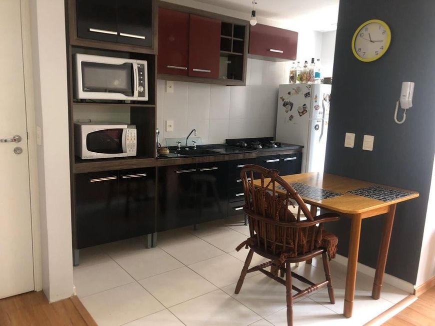 Apartamento novo, com 2 dormitórios, living 2 ambientes, cozinha americana com churrasqueira