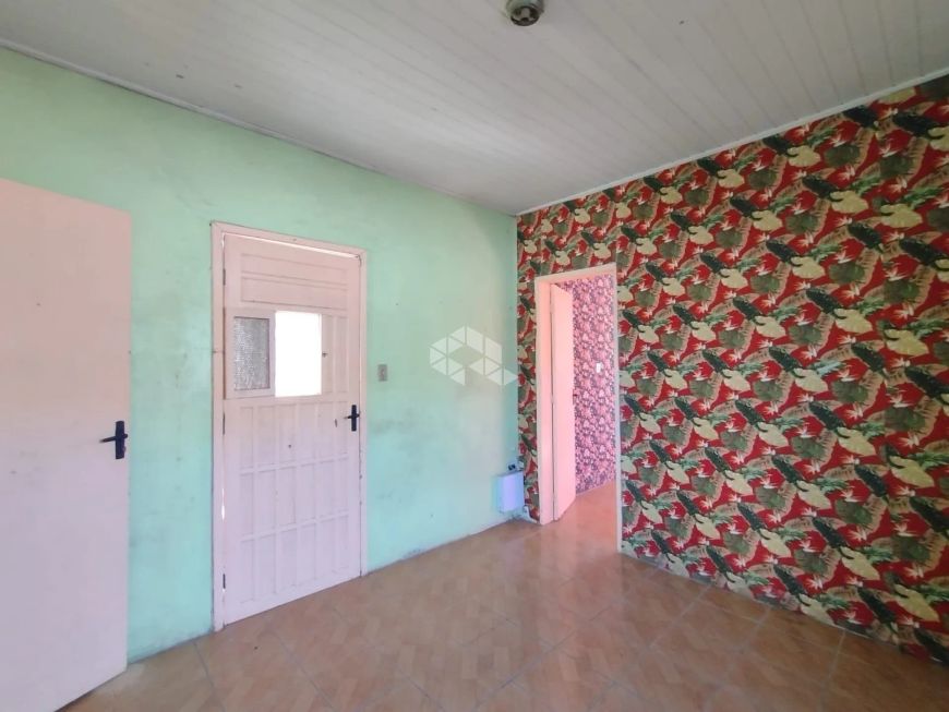 Casa com 1 quarto, 1 banheiro, cozinha, vaga garagem descoberta