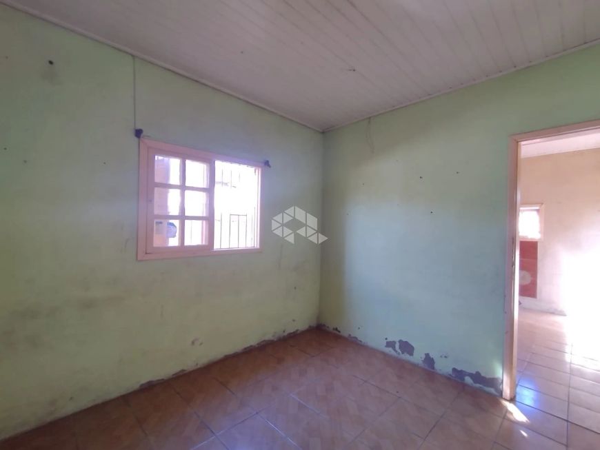 Casa com 1 quarto, 1 banheiro, cozinha, vaga garagem descoberta