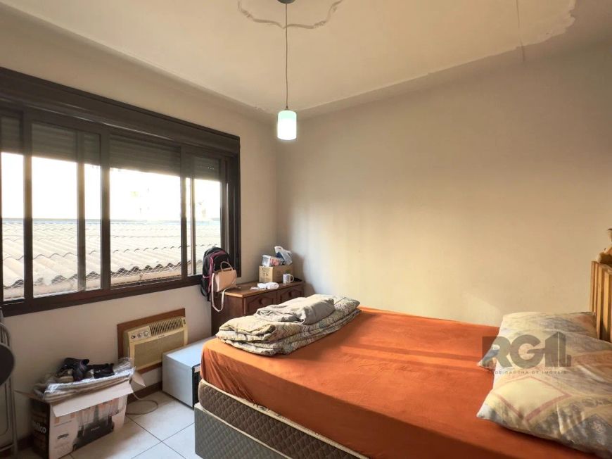 Apartamento de 51m², 2 dormitórios, living para dois ambientes, cozinha americana, área de serviço s