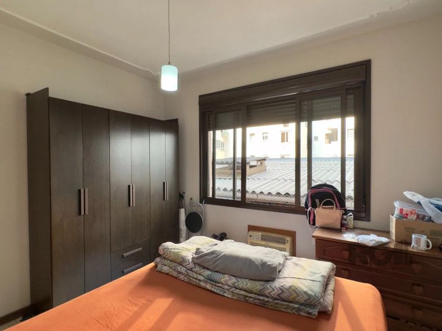 Apartamento de 51m², 2 dormitórios, living para dois ambientes, cozinha americana, área de serviço s
