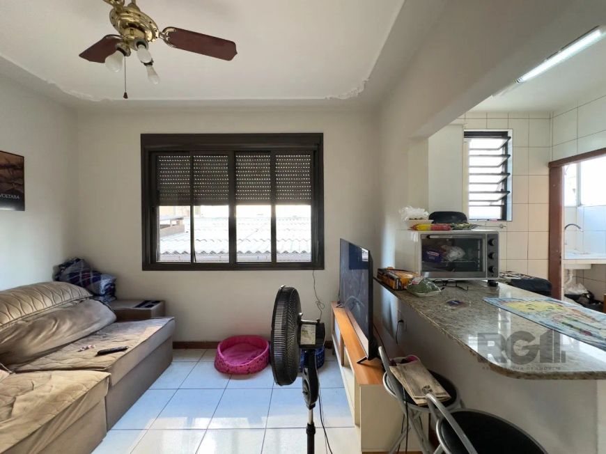 Apartamento de 51m², 2 dormitórios, living para dois ambientes, cozinha americana, área de serviço s