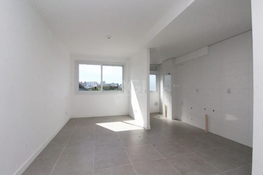 Ótimo apartamento com 58m² na Cidade Baixa! O imóvel conta com 02 dormitórios, banheiro social, livi