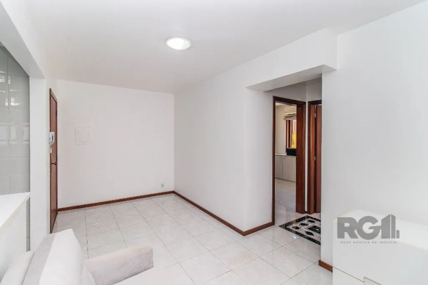 Excelente apartamento 2 dormitórios - 61 m2 - possui garagem - semi mobiliado, Living 2 ambientes co