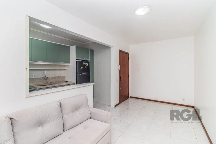 Excelente apartamento 2 dormitórios - 61 m2 - possui garagem - semi mobiliado, Living 2 ambientes co