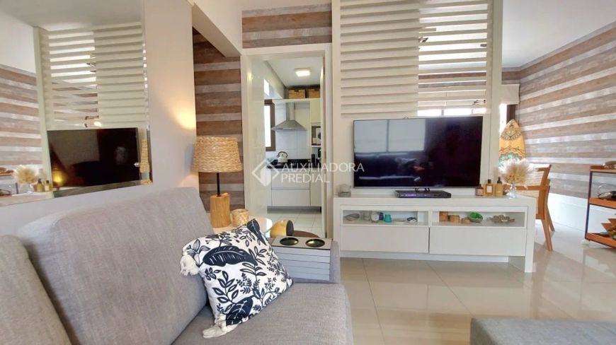 Apartamento a venda de 3 quartos com suíte no bairro Auxiliadora em Porto Alegre.