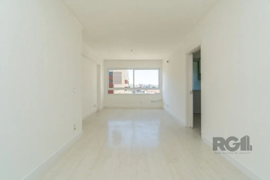 Ótimo apartamento de 2 dormitórios no bairro Menino Deus! São 60,49m² de área privativa distribuídos