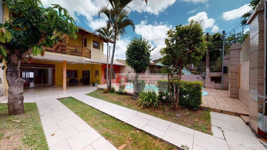 Casa à venda, 300 m² por R$ 775.000,00 - Rubem Berta - Porto Alegre/RS