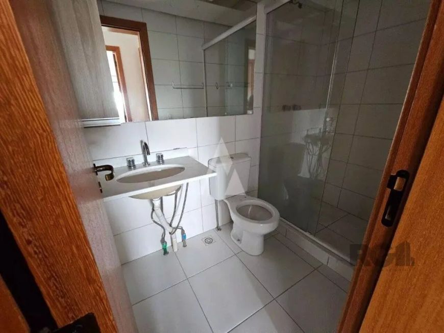 Apartamento lateral semi mobiliado com 02 dormitórios, living para 02 ambientes, banheiro social, ar