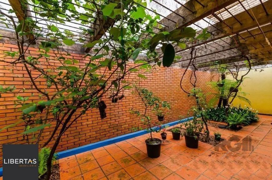 Casa 4 dormitórios à venda Chácara das Pedras Porto Alegre/RS