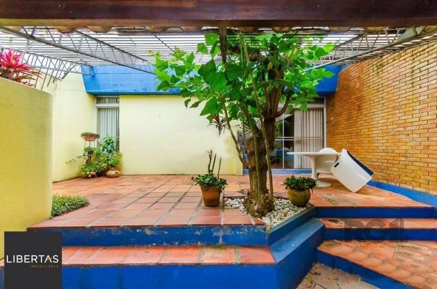 Casa 4 dormitórios à venda Chácara das Pedras Porto Alegre/RS