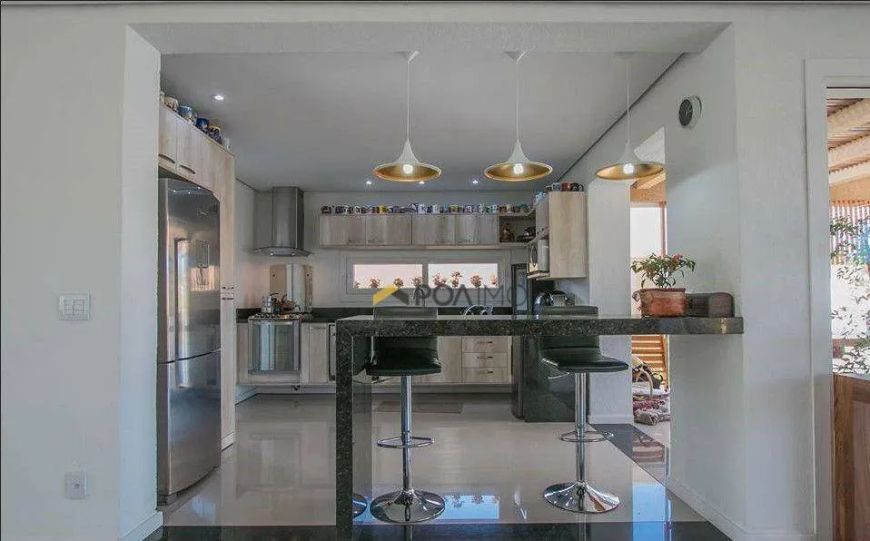 Casa com 4 dormitórios à venda, 325 m² por R$ 2.180.000,00 - Cavalhada - Porto Alegre/RS