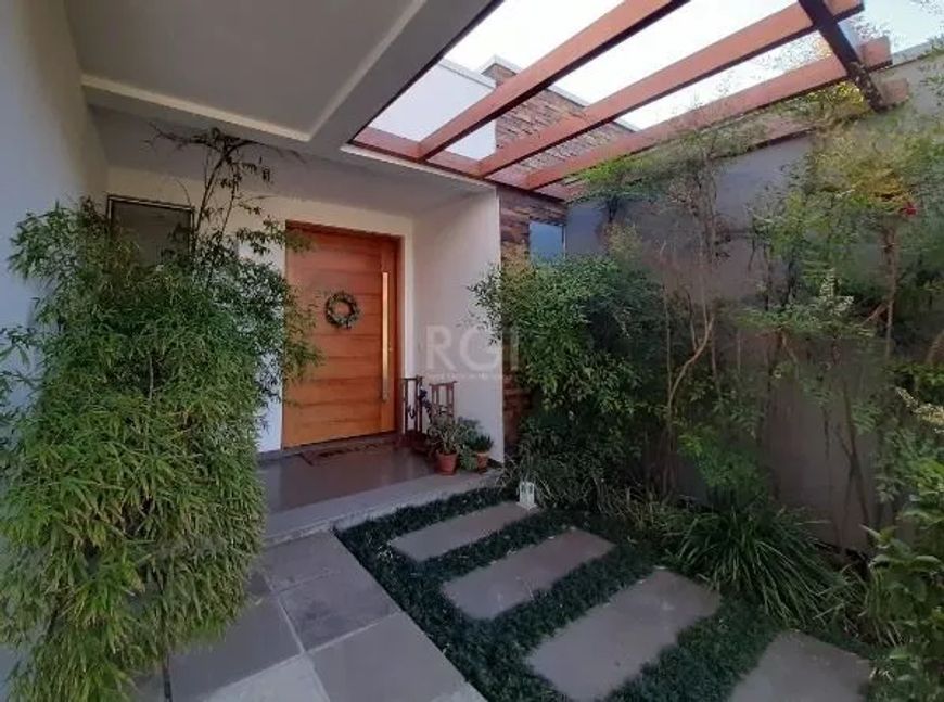 Casa Condominio em Porto Alegre, no bairro Belém Novo, com 3 dormitório(s), e 3 banheiros, à venda.
