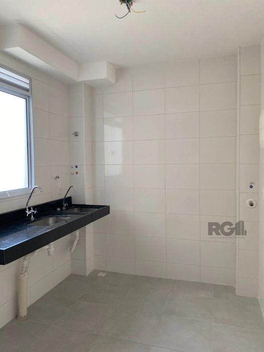 Apartamento com 41m², 2 dormitórios, living dois ambientes estar/jantar, cozinha americana com tampo