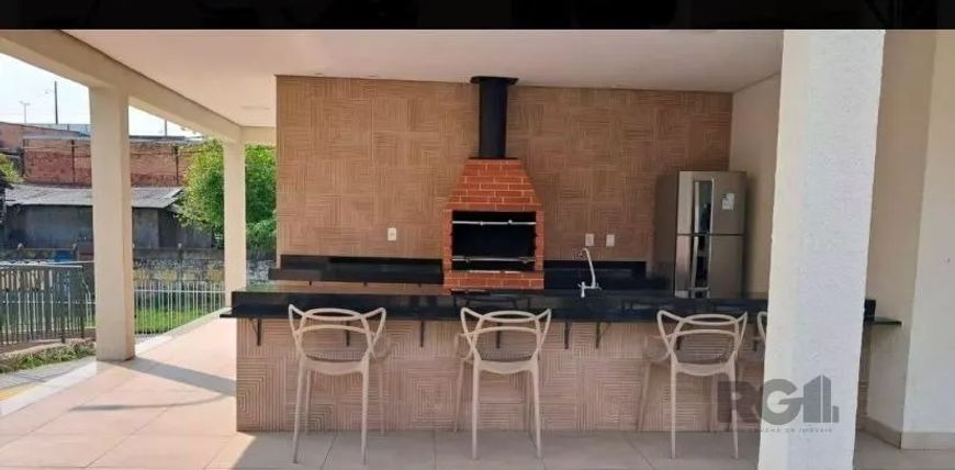 Apartamento com 41m², 2 dormitórios, living dois ambientes estar/jantar, cozinha americana com tampo