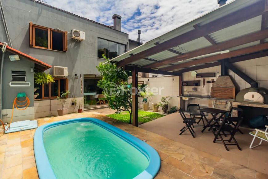 Casa em Condomínio à venda Rua Adriano Pereira da Silva, Vila Nova - Porto Alegre