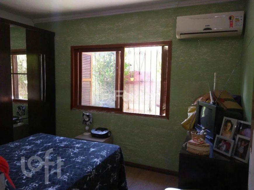 Casa à venda Avenida Vereador Roberto Landell de Moura, Campo Novo - Porto Alegre