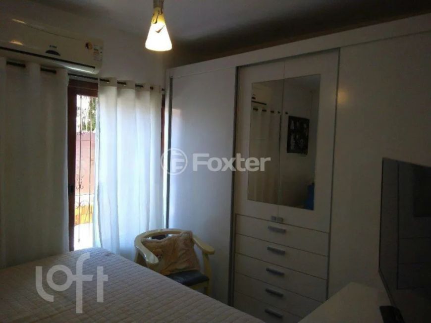 Casa à venda Avenida Vereador Roberto Landell de Moura, Campo Novo - Porto Alegre