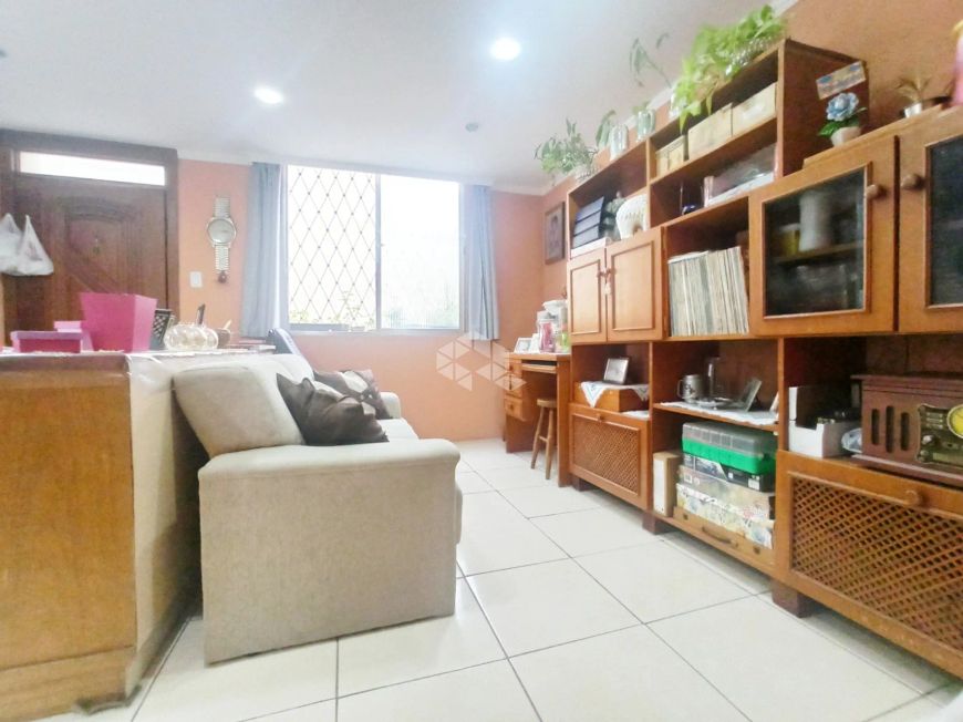 Apartamento com 03 dormitórios e garagem à venda no bairro Menino Deus