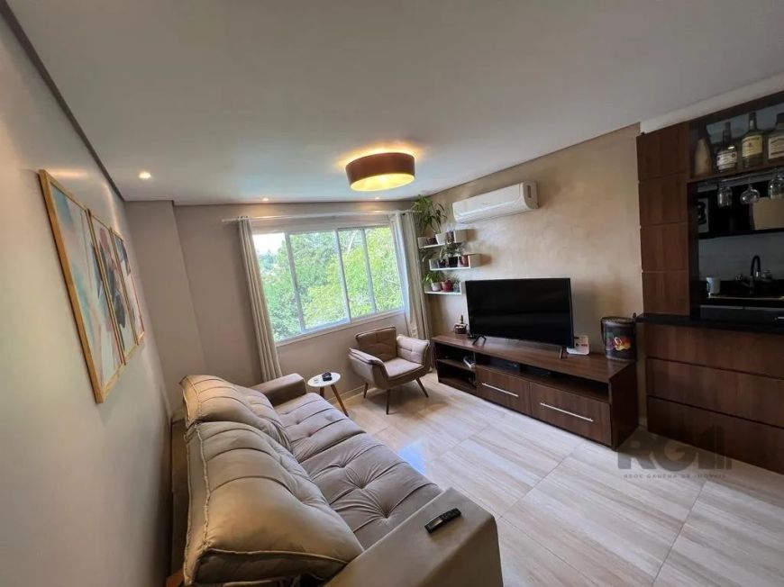 Apartamento de 03 dormitórios com suíte e móveis planejados, estar e jantar, cozinha americana com m