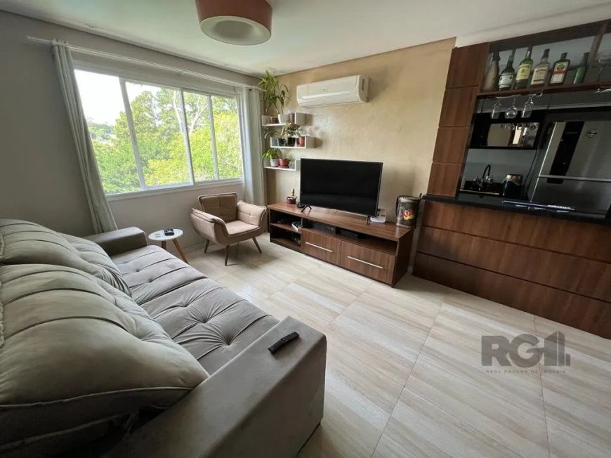 Apartamento de 03 dormitórios com suíte e móveis planejados, estar e jantar, cozinha americana com m