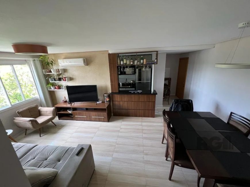 Apartamento de 03 dormitórios com suíte e móveis planejados, estar e jantar, cozinha americana com m