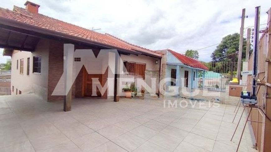 Casa com 3 dormitórios e 4 vagas à venda no bairro Rubem Berta em Porto Alegre com 200,00m² por R$ 6