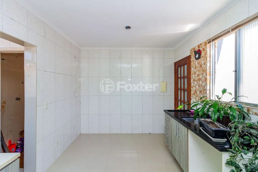 Apartamento impecável, dois quartos, uma vaga, à venda no Menino Deus