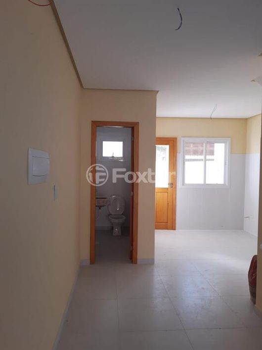 Casa à venda Rua Itacyr Rossi, Guarujá - Porto Alegre
