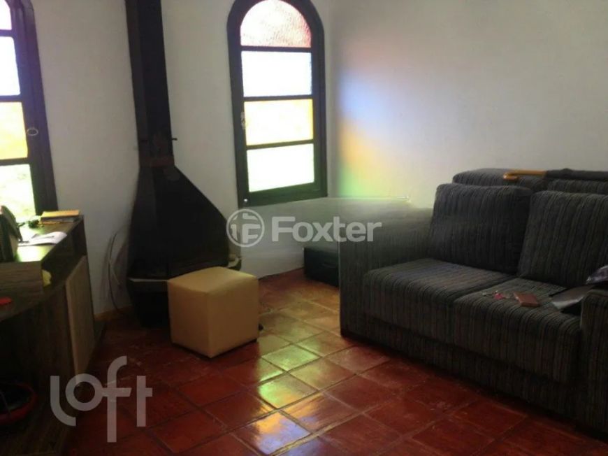 Casa à venda Avenida Guarujá, Guarujá - Porto Alegre