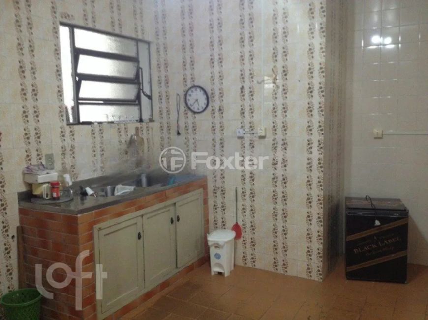 Casa à venda Avenida Guarujá, Guarujá - Porto Alegre