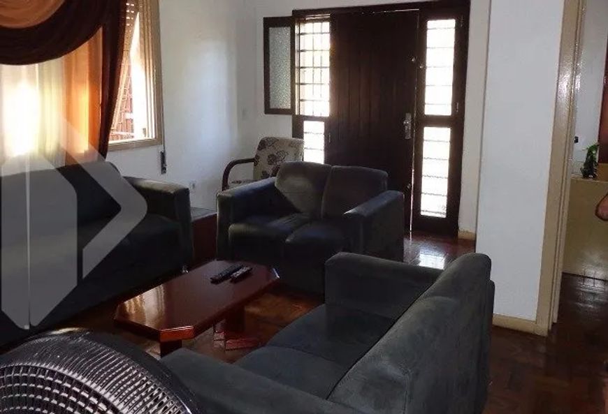 Casa residencial à venda no bairro Menino Deus com 4 dormitórios e 265 m².
