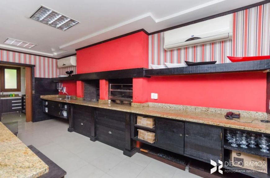 Casa de condomínio à venda no bairro Tristeza com 3 dormitórios e 380 m² de área útil