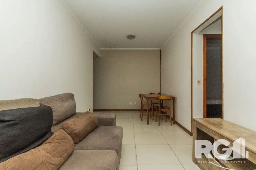 Excelente apartamento com 2 dormitórios, living para dois ambientes com sacada e churrasqueira, dois