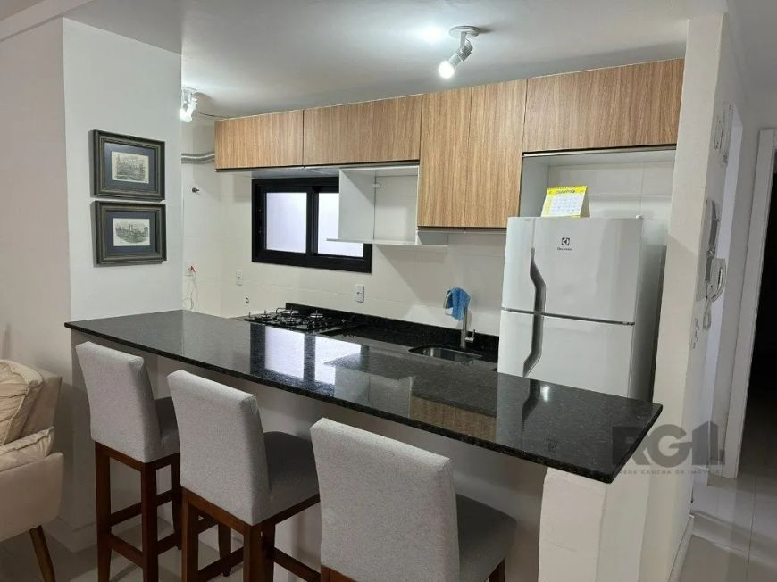 Apartamento de 1 dormitórios sendo uma suite no bairro Menino Deus , living ambiente, cozinha, banhe