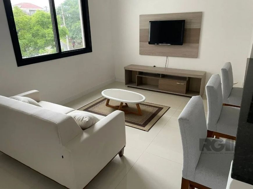 Apartamento de 1 dormitórios sendo uma suite no bairro Menino Deus , living ambiente, cozinha, banhe