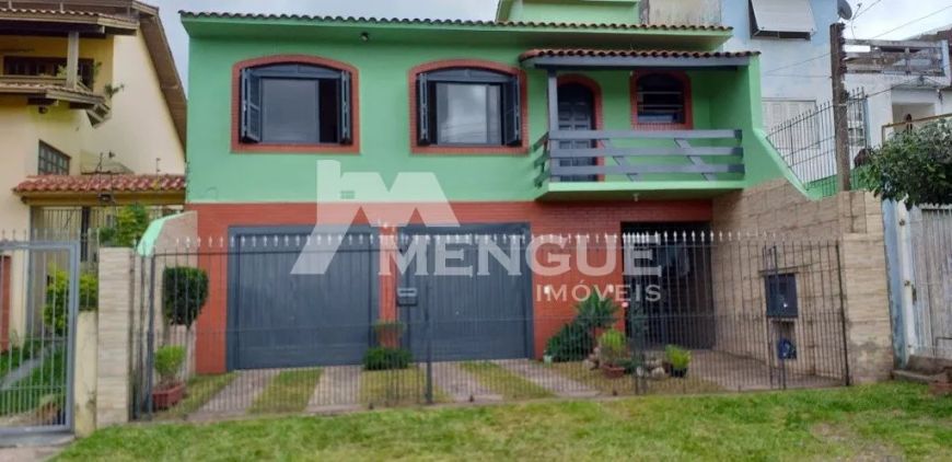 Vende-se Casa com 3 dormitórios sendo 1 suíte, vaga para 6 carros no Bairro J. Carvalho por R$ R$ 83