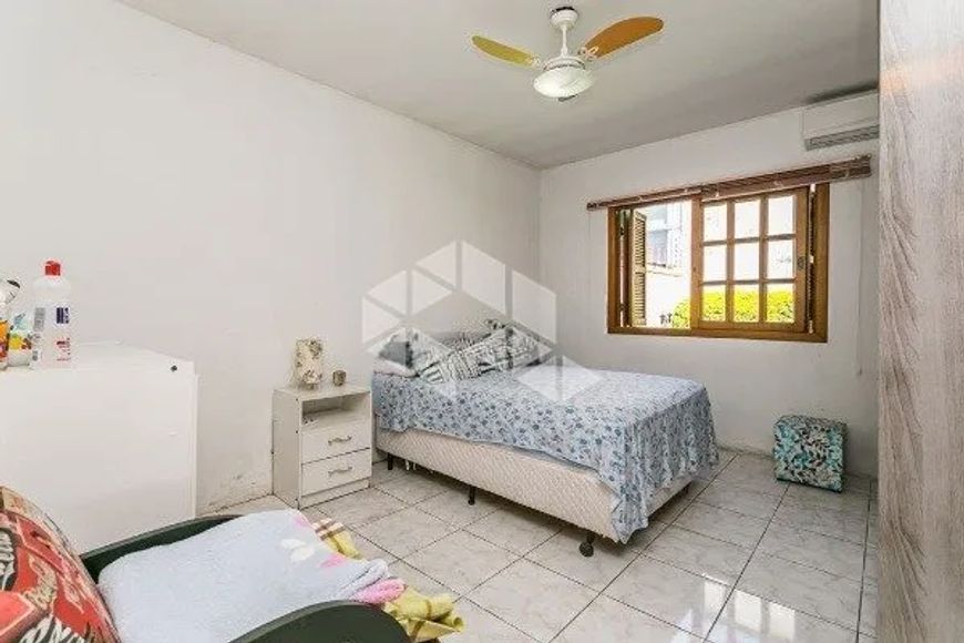 Casa 5 dormitórios, sacada, churrasqueira, pátio, Jardim Planalto, Porto Alegre