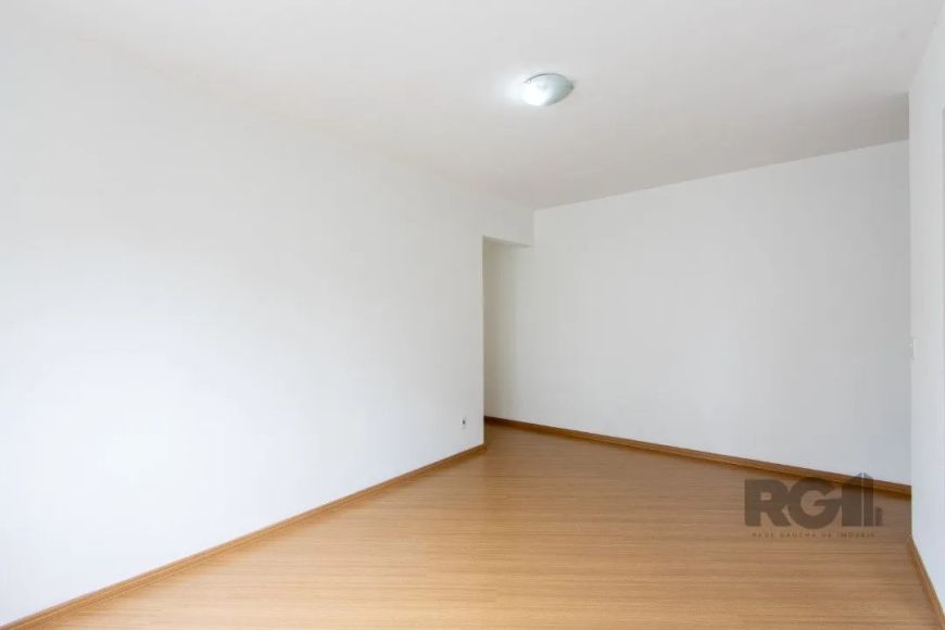 Descubra o seu novo lar no coração do Menino Deus, em Porto Alegre! Este aconchegante apartamento po