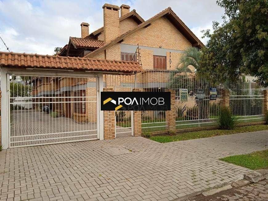 Casa com 3 dormitórios à venda por R$ 850.000,00 - Tristeza - Porto Alegre/RS