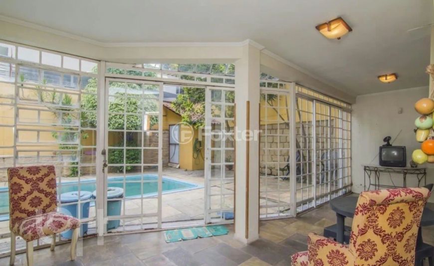 Casa à venda Avenida General Barreto Viana, Chácara das Pedras - Porto Alegre