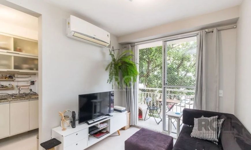 Ótimo apartamento no Condomínio Canto dos Pássaros, fundos, de 2 dormitórios, vaga e infra. Possui l