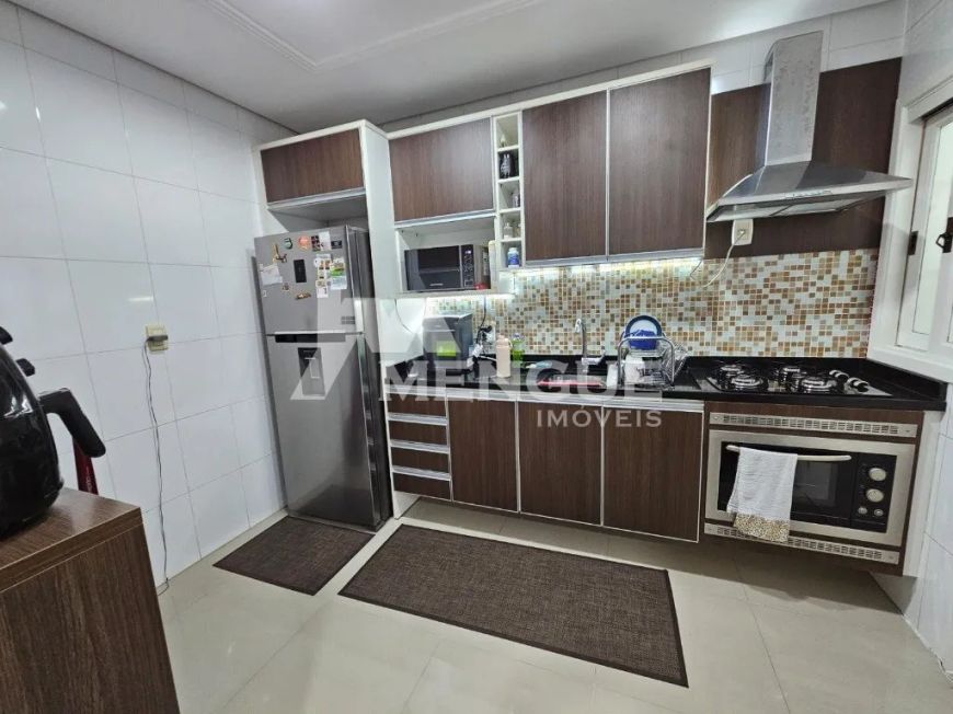 Casa residencial com 3 dormitórios e 2 vagas em condomínio à venda no bairro Ecoville em Porto Alegr