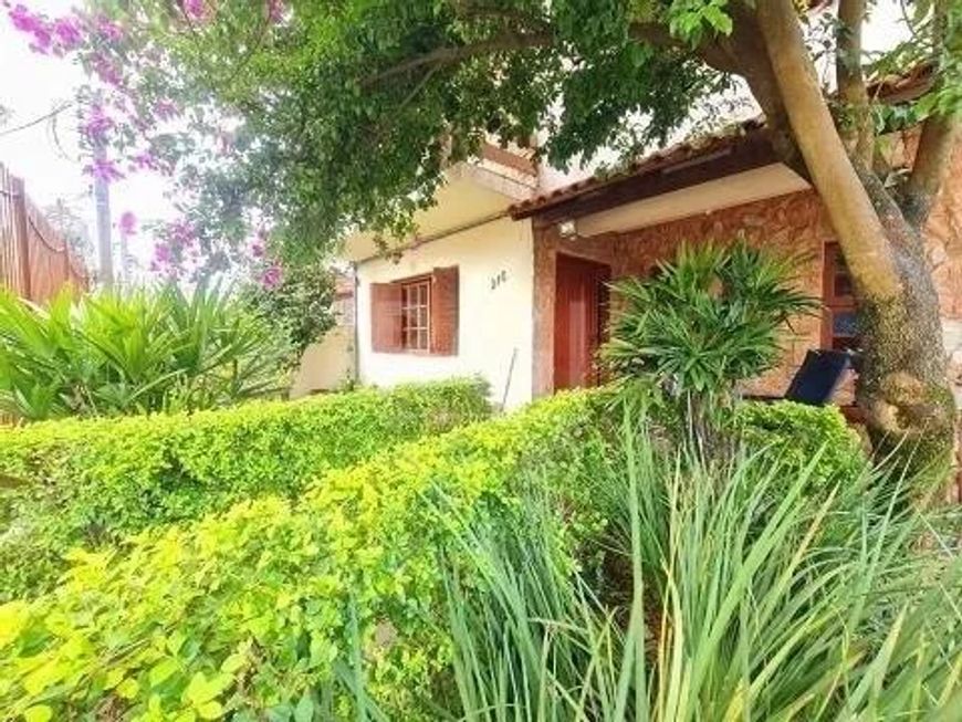 Casa/sobrado com edícula consolidados em terreno com 11,55m de frente por 58m de extensão de frente