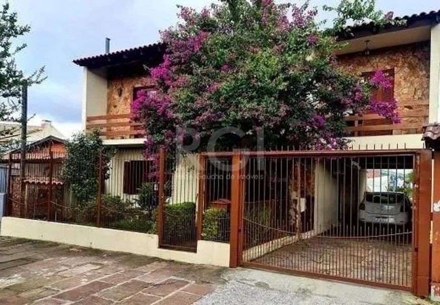 Casa/sobrado com edícula consolidados em terreno com 11,55m de frente por 58m de extensão de frente